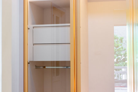 Luxurious white and gold wooden cabinetの写真素材