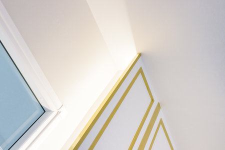 Modern home wall decoration in white and gold.の写真素材