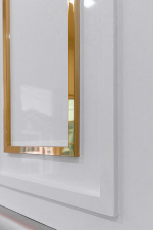 Modern home wall decoration in white and gold.の写真素材