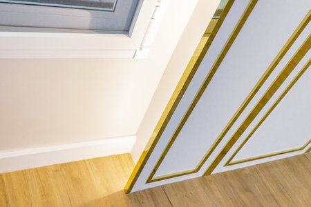 Modern home wall decoration in white and gold.の写真素材