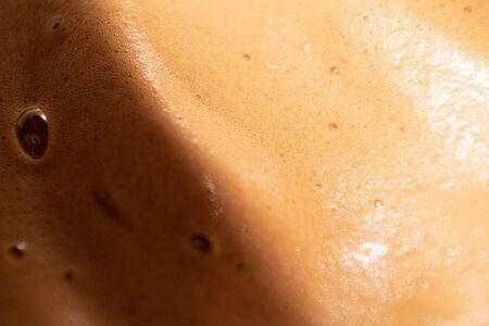 Coffee foam extreme close up. Macro texture and backgroundの写真素材