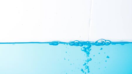 Water splash and ripple isolated on white background