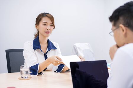 Pictures of business people interviewing employees to join the teamの写真素材