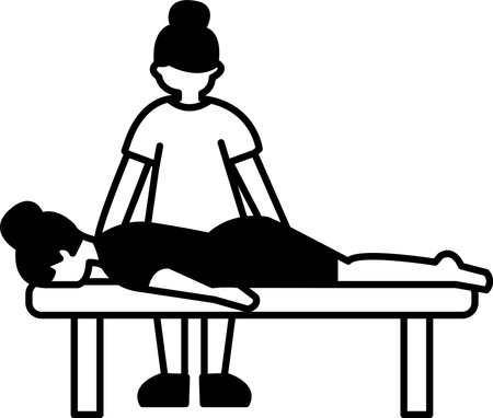 A woman is laying on a massage table while a woman in a shirt massages herのイラスト素材