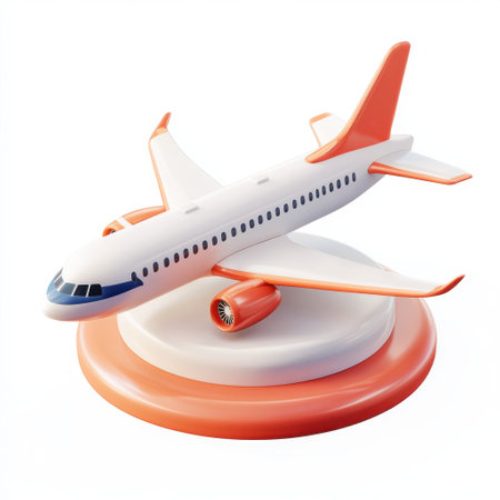 A white and orange airplane is sitting on a red base. The airplane is a toy and is not in useの素材