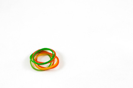 Small pile of rubber band on white backgroundの写真素材