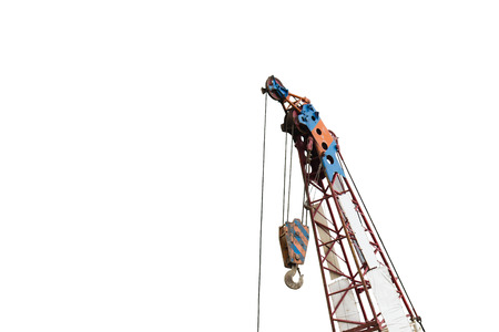 Crane at construction site with white backgroundの写真素材