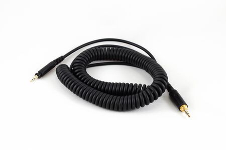 Black cable of headphone on white background