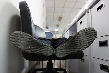 bottom shoes of men sleeping