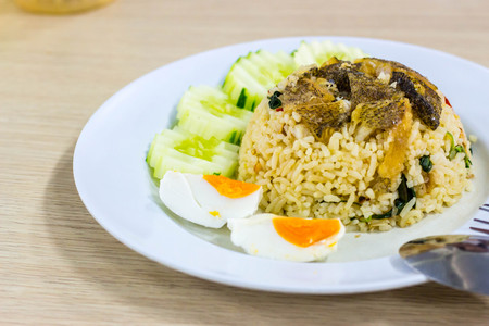Rice with fish, egg, and cucumberの写真素材