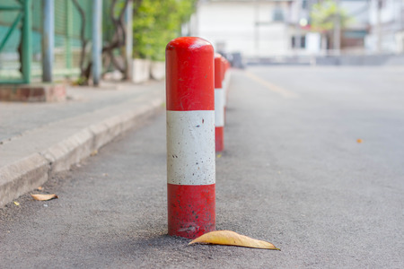 Road block pole in straight lineの写真素材