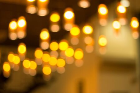 Blurry yellow bokeh of street light