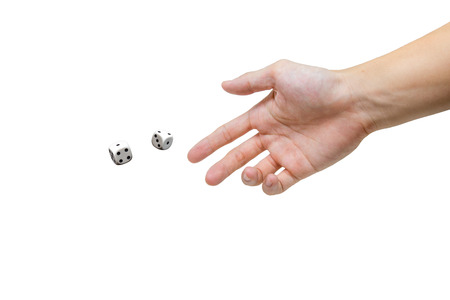 Hand throwing two dices on white background