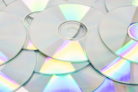 Background of CD and DVD disksの写真素材