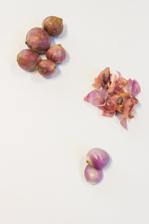 Small red onion on white backgroundの写真素材