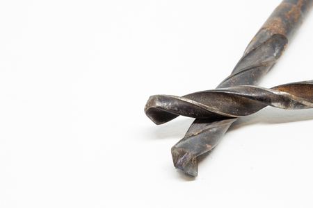 Drill bits in different size and shape on white backgroundの写真素材