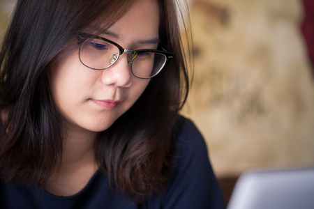 Asian woman using Laptop computerの写真素材