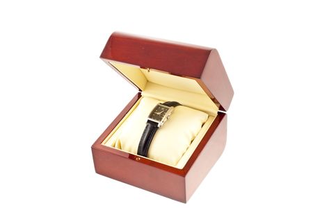 female silver watch in a wood gift box on a white backgroundの写真素材