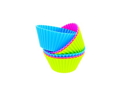 six multicolor silicone muffin pans on a white backgroundの写真素材