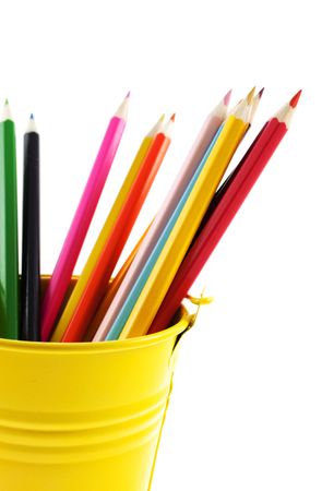 crayons in yellow bucket. White background. small GRIPの写真素材