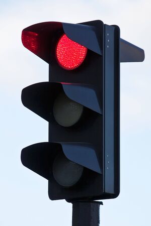 red light on black traffic signalの写真素材
