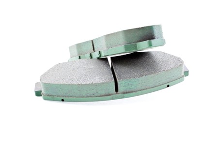 front car brake pads on a white background. horizontal shotの写真素材