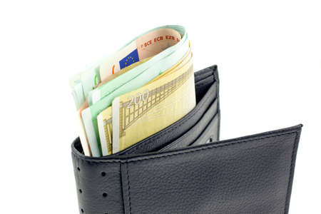 black leather wallet with euro notes on white background. horizontal shotの写真素材