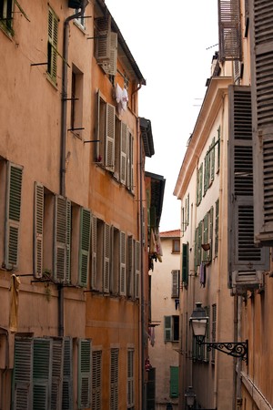 Old street of french town Nice. vertical shotの写真素材
