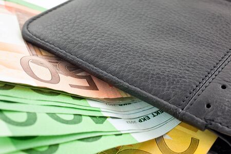black leather wallet with euro notes. horizontal macro shotの写真素材