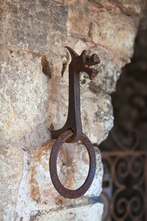 Old iron doorhandle, dragon shaped. Vertical shotの写真素材