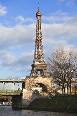 Eiffel Tower at December on cloud blue sky background. vertical shotの写真素材