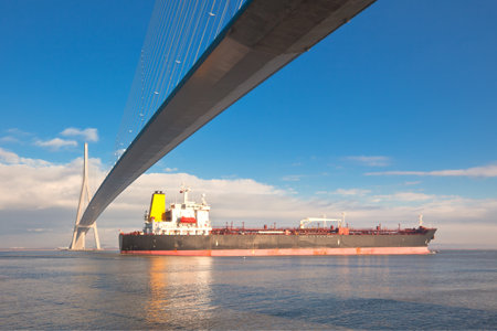 Normandy bridge view (Pont de Normandie, France) and cargo shipのeditorial素材