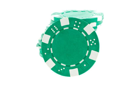 green poker chips heap isolated on white background. closeup horizontal shotの写真素材