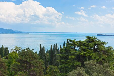 View Over Lake Garda in Italy from forest coastの写真素材