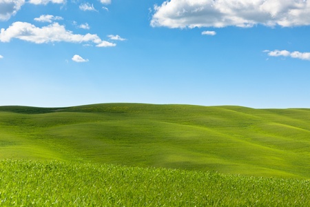 Outdoor green field view with blue sky and clouds  Tuscan Val dの写真素材