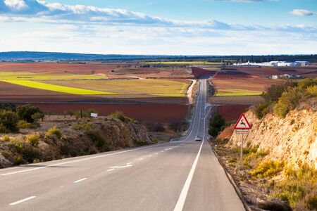 Landscape picture of empty country road in winter Spainの写真素材