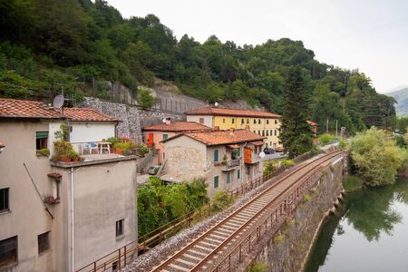 Railway along the river at Borgo a Mozzano, Tuscany, Italyの写真素材