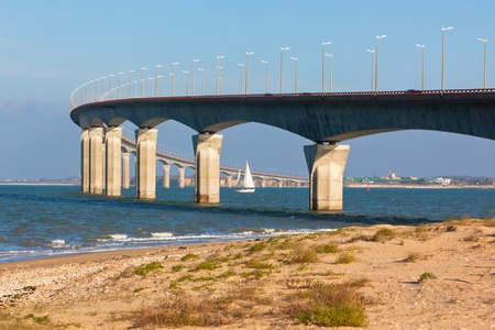 Curved Concrete Bridge over the water. Horizontal shotの写真素材