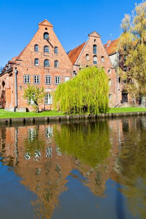 Architecture in Lubeck, Germany. Old houses reflectionの写真素材
