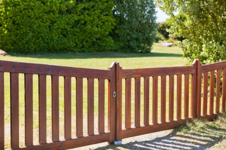 Country Wooden Gate Entry to Courtyard. Sunny dayの写真素材
