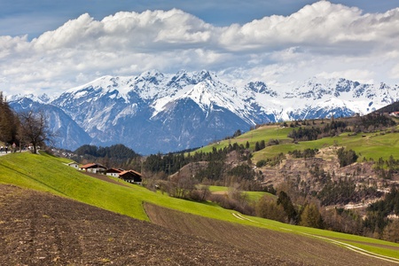 Spring in Tirol Alps. Landscape with meadows and mountainsの写真素材