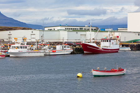 Typical Iceland Harbor with Fishing Boats in Summer Dayのeditorial素材