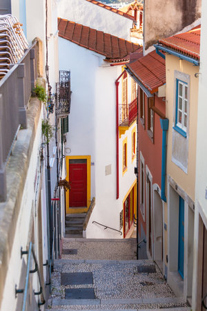 Narrow Street with Stairs in Old Town, Coimbra, Portugalのeditorial素材