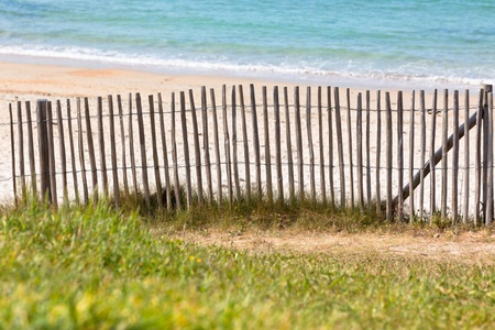 Wooden fence at Northern beach in France. Horizontal shotの写真素材