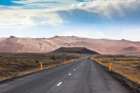Highway through Iceland Mountains landscape. Hverir sulfuric springs. Horizontal shot