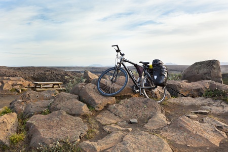Bike with active equipment at Iceland mountains scene. Horizontal shot