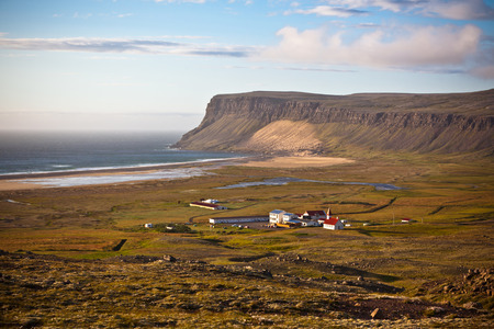 Icelandic Landscape with small Location  Breidavik  at Ocean Coastlineの写真素材