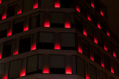 Illuminated House Facade in European City at Nightの写真素材