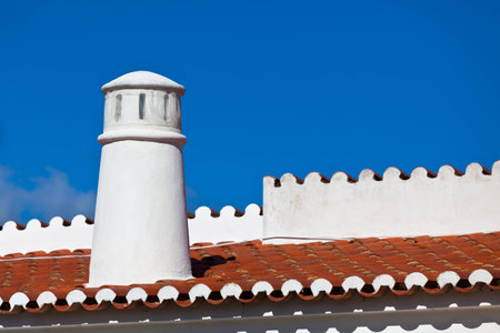 Unrecognizable Part of Residential House at Algarve, Portugal  Bright Blue Sky as a Backgroundの写真素材