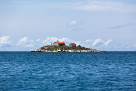 Lighthouse on a Small Island in the Adriatic Sea  Croatiaの写真素材